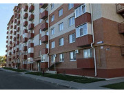 Дом по ул. Коммунистическая